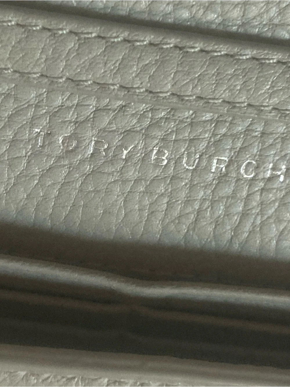 Tory Burch Pebbled Crossbody Wallet in Gray with beautiful silver logo